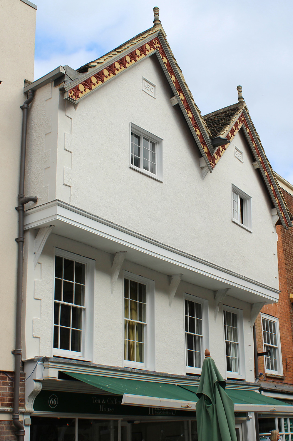 Restoring a damaged facade that features on the Heritage Trail in Gloucester, Grade 1 listed. Render repairs and re lime washed.
